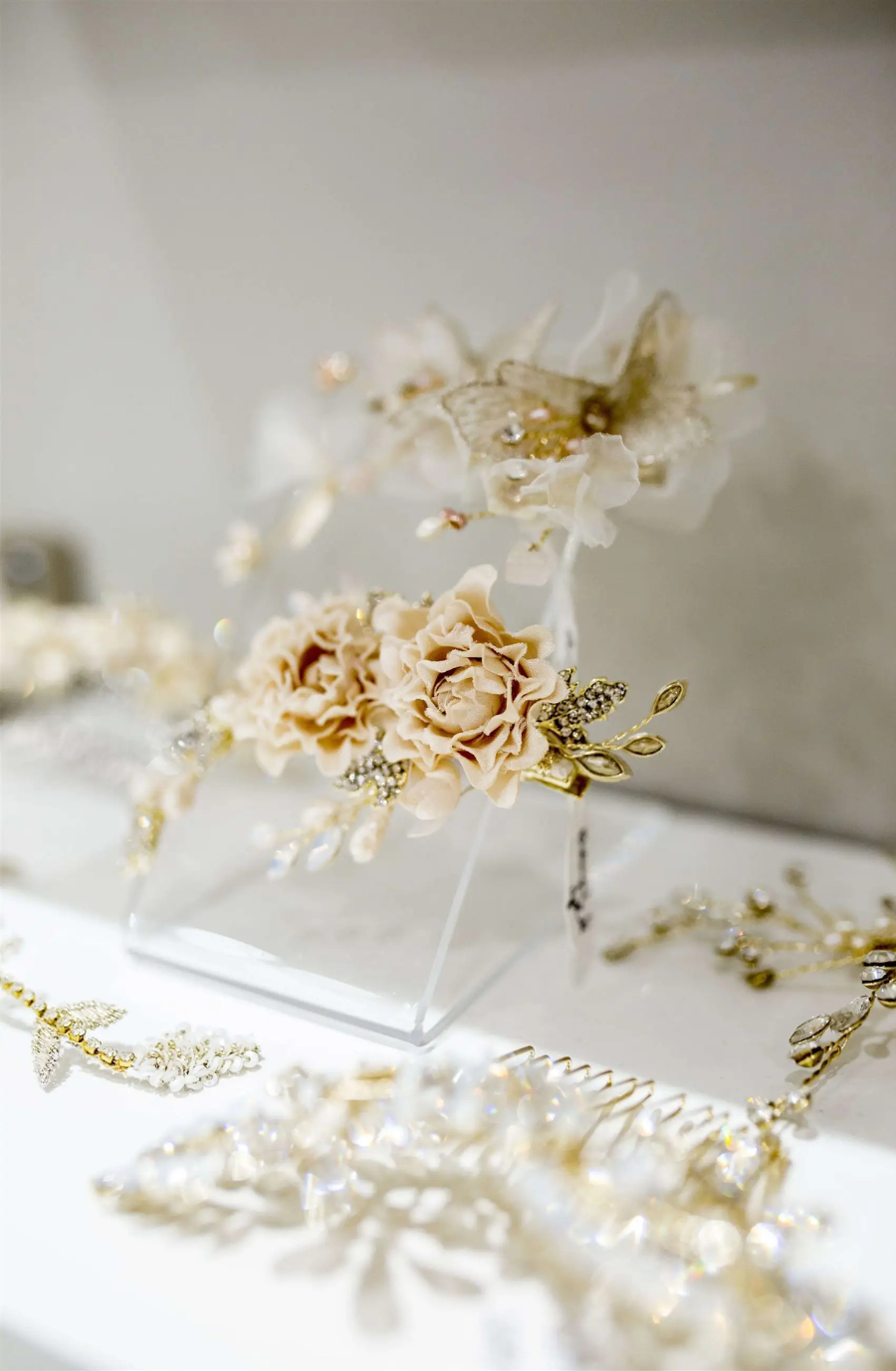 image shows a collection of bridal hair accessories at an elegant affair