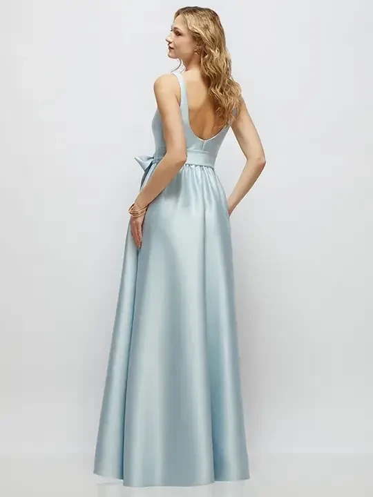 model is wearing a sleeveless light blue bridesmaid dress