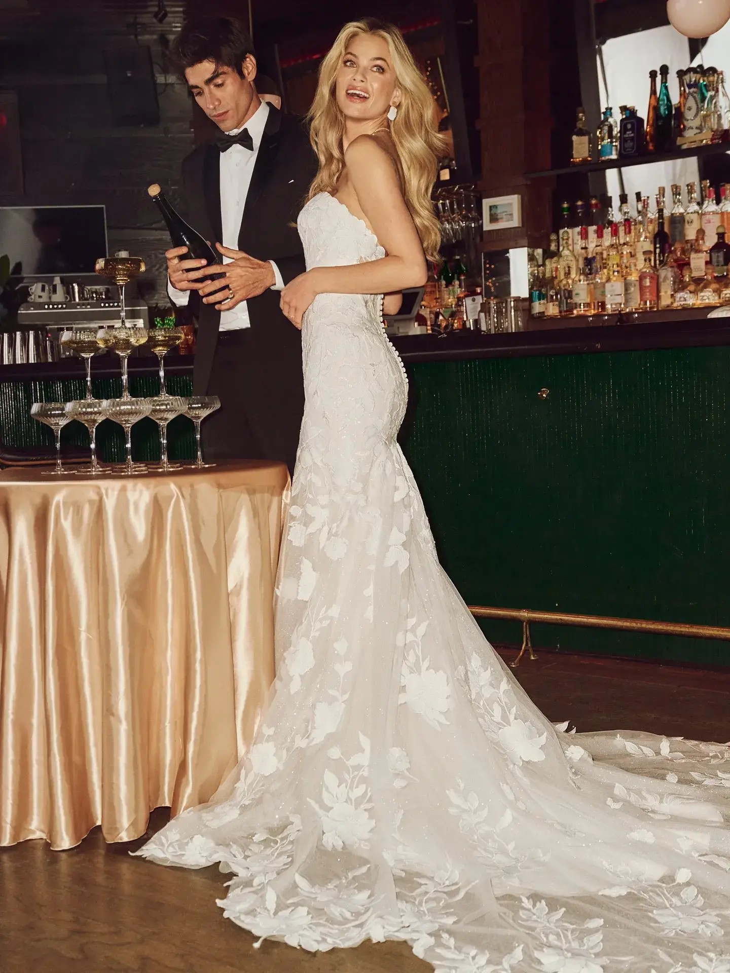 Trains That Trail in Style: Our Favorite Dramatic Wedding Dress Backs Image